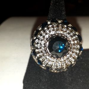 Woman blue and white costume jewelry ring